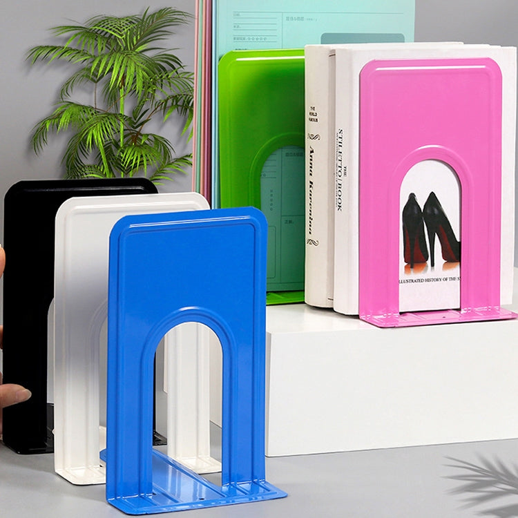 Set of colorful metal bookends—blue, pink, white, and black—U-shaped