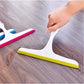 Yellow glass squeegee wiper with white handle and curved rubber edge