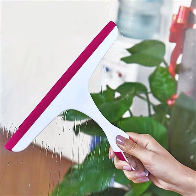 Pink glass window squeegee wiper with white handle and curved rubber edge