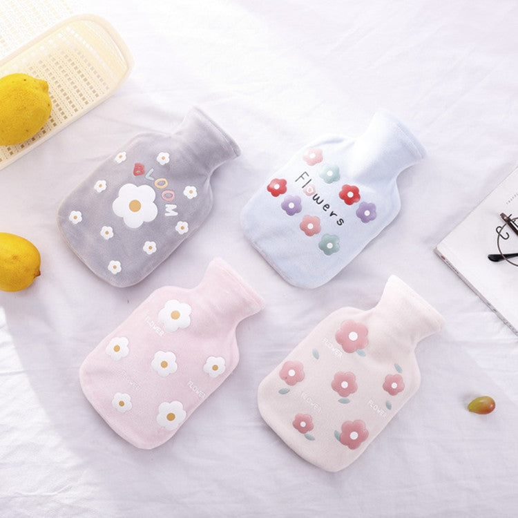 Set of plush hot water bottle covers with flower prints in pink and light blue