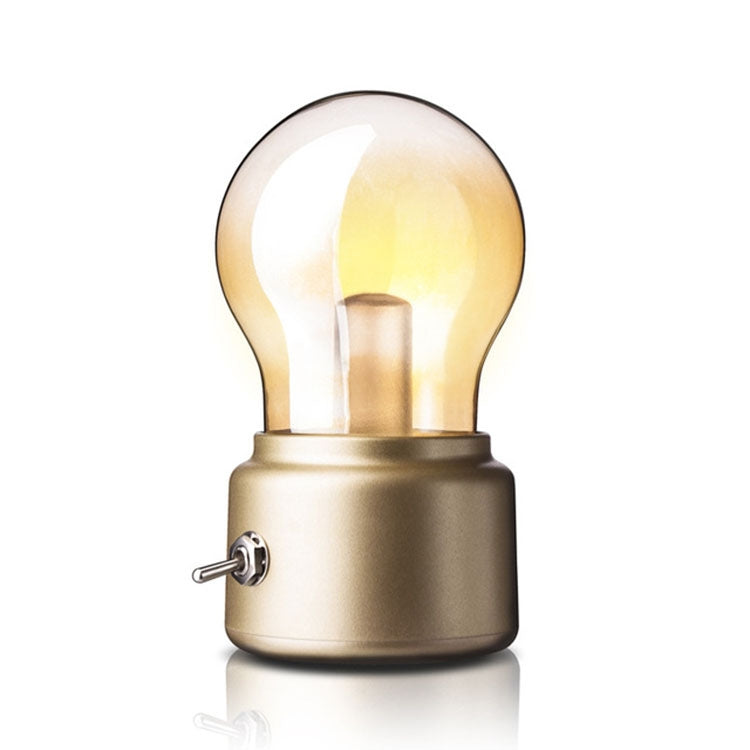 Gold USB night light with vintage-style glowing bulb and metal side knob