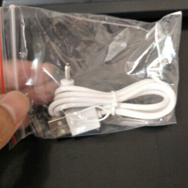 USB night light charging cable with white cord and connector in sealed plastic bag