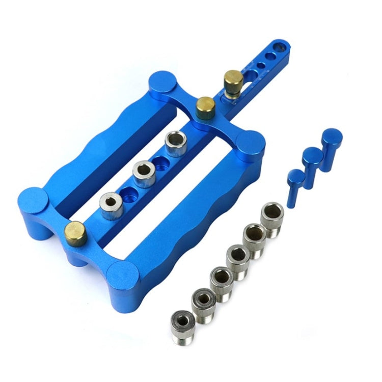 Blue vertical triple-hole dowel locating punch with metal guide bushings and pins