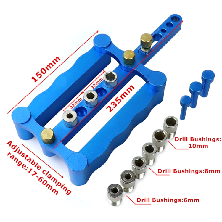 Blue vertical triple-hole dowel locator with built-in ruler and metal guide bushings
