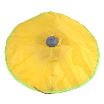 Yellow cat playing mat with gray dome motor and green trim, circular center