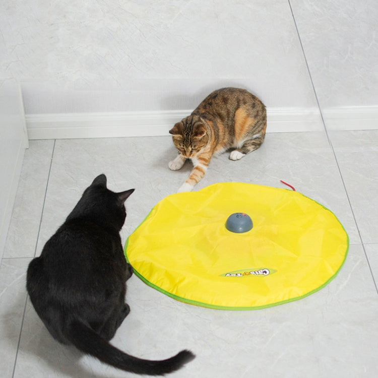 Yellow circular cat playing mat with gray dome motor and green edge, with cats