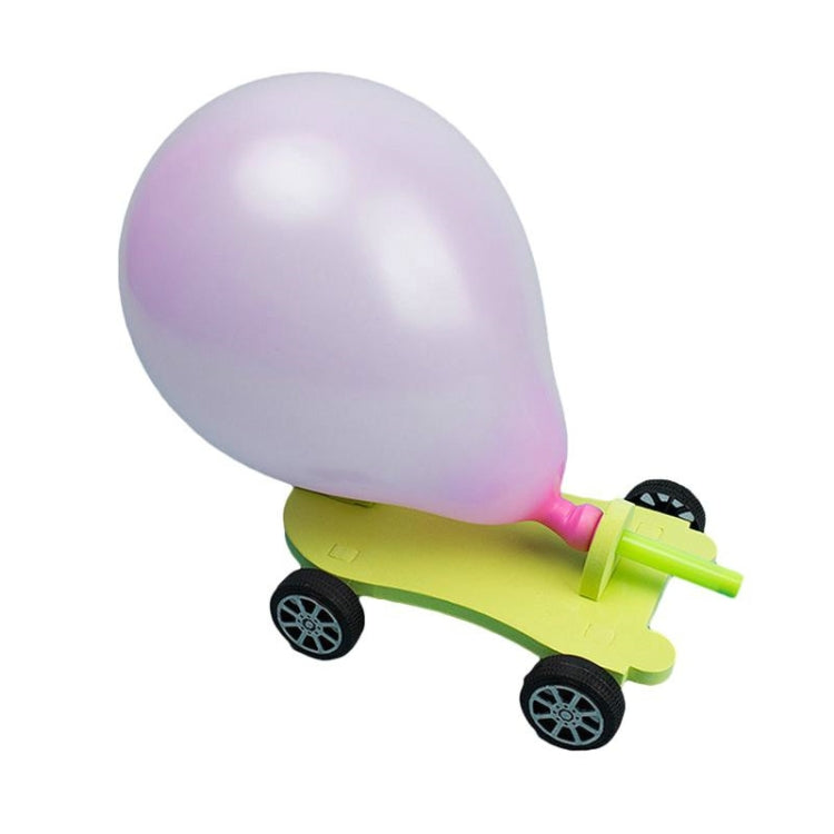Balloon recoil car kit with lilac balloon and lime green body, black wheels