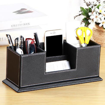 Black leather desktop pen holder organizer with multiple compartments and pen sockets