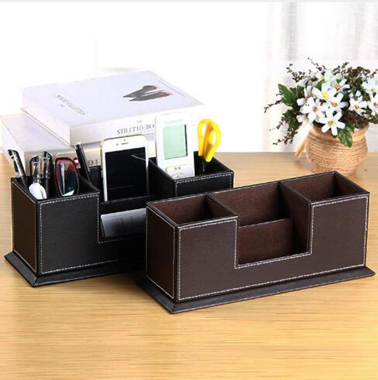 Brown leather desktop pen holder organizer with angled compartments for stationery