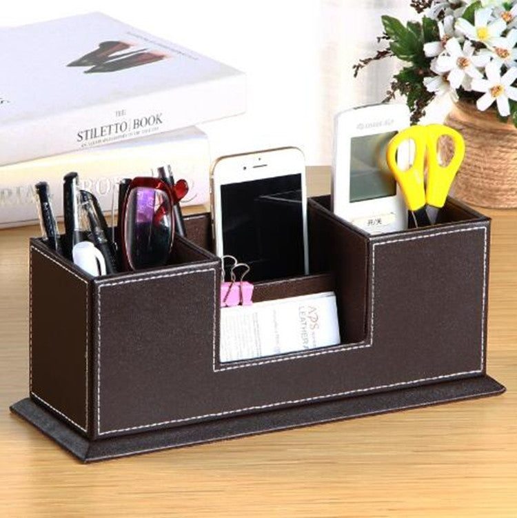 Black leather desktop pen holder organizer with multiple open compartments for stationery
