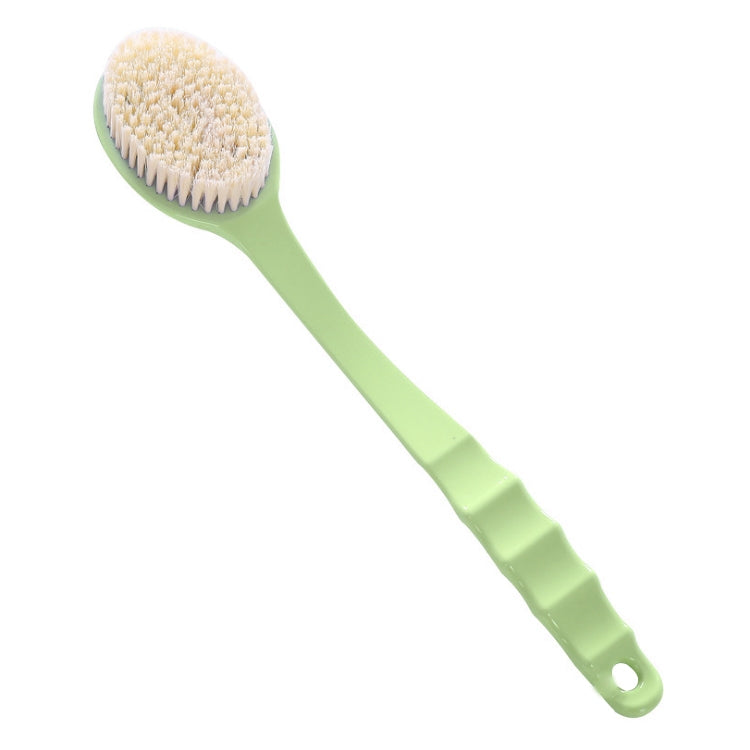 Long-handled bath brush with soft white bristles and green ergonomic handle.