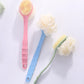 Three long-handled bath brushes with soft bristle heads and attached white scrub puffs.