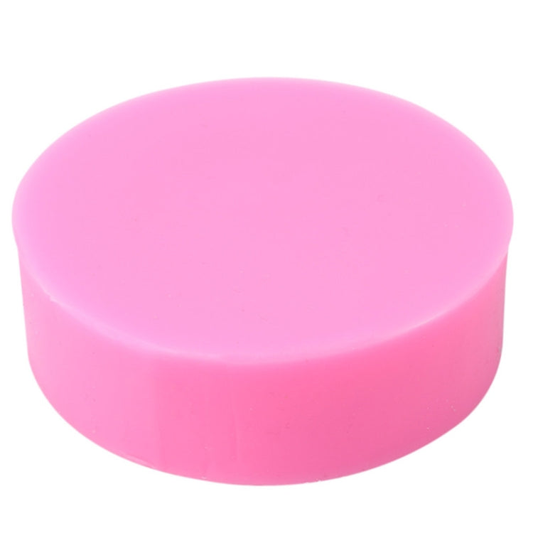Pink round silicone mold, smooth top with no visible embossing.