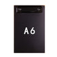 Black A6 clipboard folder with metal clip and centered A6 label.