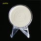 Clear acrylic round coin holder on a three-prong tripod stand