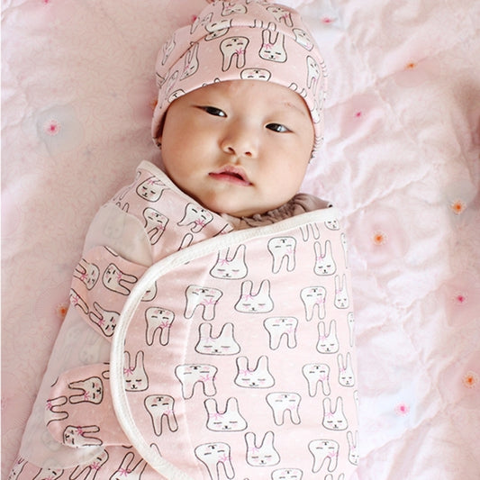 Baby cotton swaddle sleeping bag with matching knitted cap, light pink bunny print