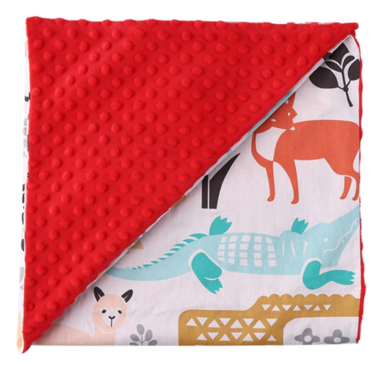 Cotton baby quilt blanket with red textured backing and forest animal scene