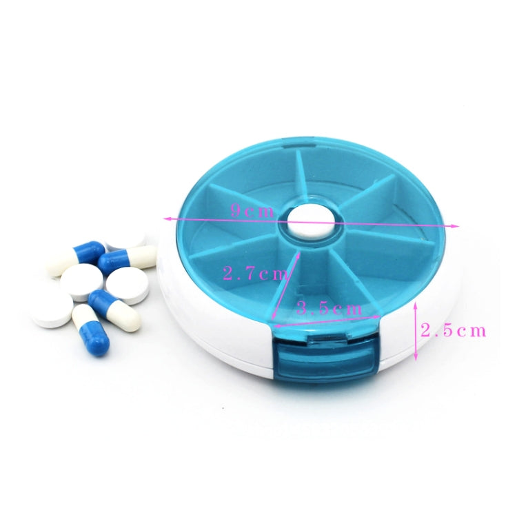 Blue rotating plastic pill box with seven grid compartments and size indicators