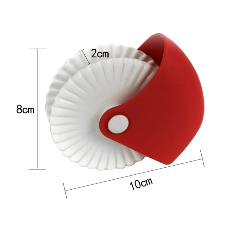 Red and white pasta cutting roller wheel tool, approx. 10cm x 8cm