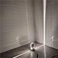 White LED semicircle wall spotlight emitting cool white light from dome head