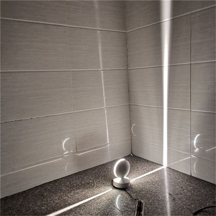 White LED semicircle wall spotlight emitting cool white light from dome head