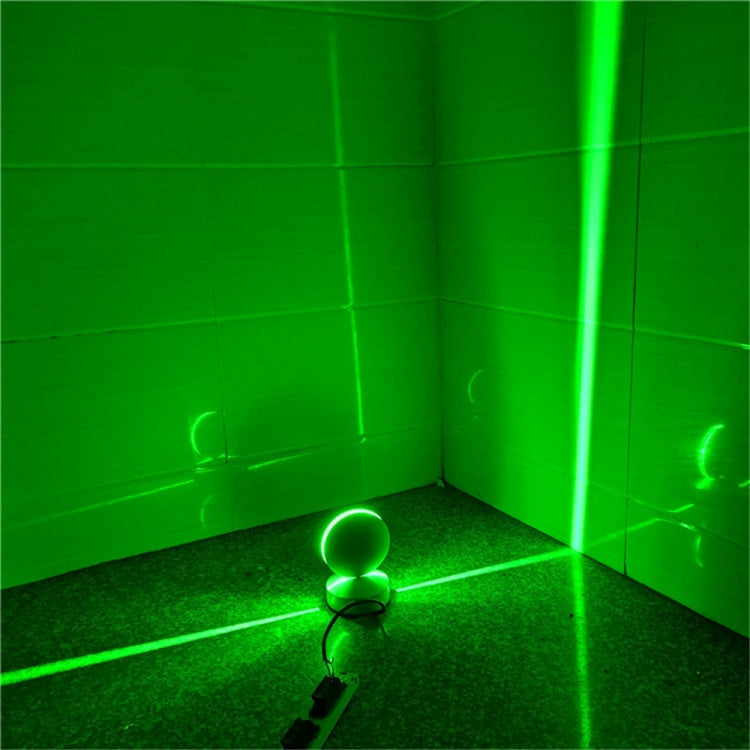 LED wall spotlight with semicircle head glowing green light in corner