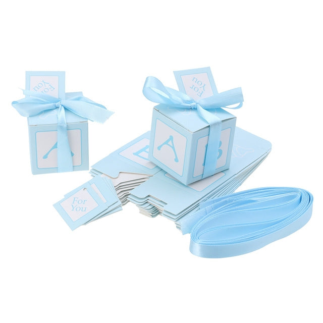 Set of blue candy favor boxes with ribbon bows and 'For You' cards showing A, B, and Y icons