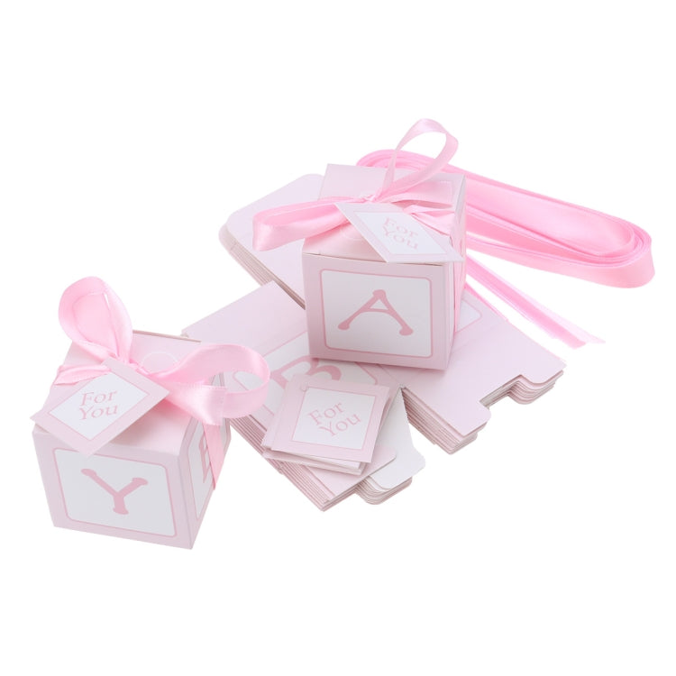 Pink candy favor boxes with ribbon bows and 'For You' cards, showing A and Y icons