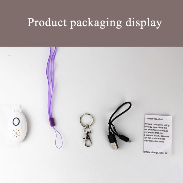 Mini portable ultrasonic insect repellent kit with white device, keychain, and USB cable