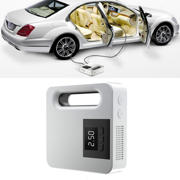 White portable car tire air pump with digital screen, handle, and control buttons