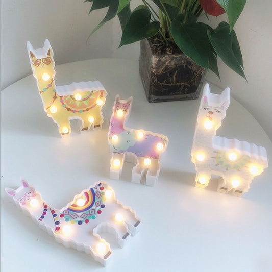 Alpaca-shaped LED night lights set, multiple standing figures with warm glow