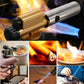 Handheld torch with brass-and-silver nozzle producing blue flame