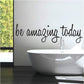 Removable wall sticker with cursive text "be amazing today" applied to wall