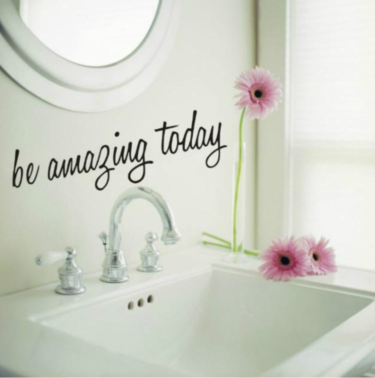 Removable wall sticker with "be amazing today" cursive text on bathroom wall