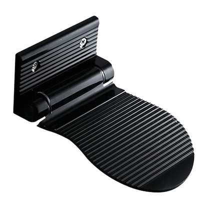 Black wall-mounted shower foot rest with ribbed non-slip folding design