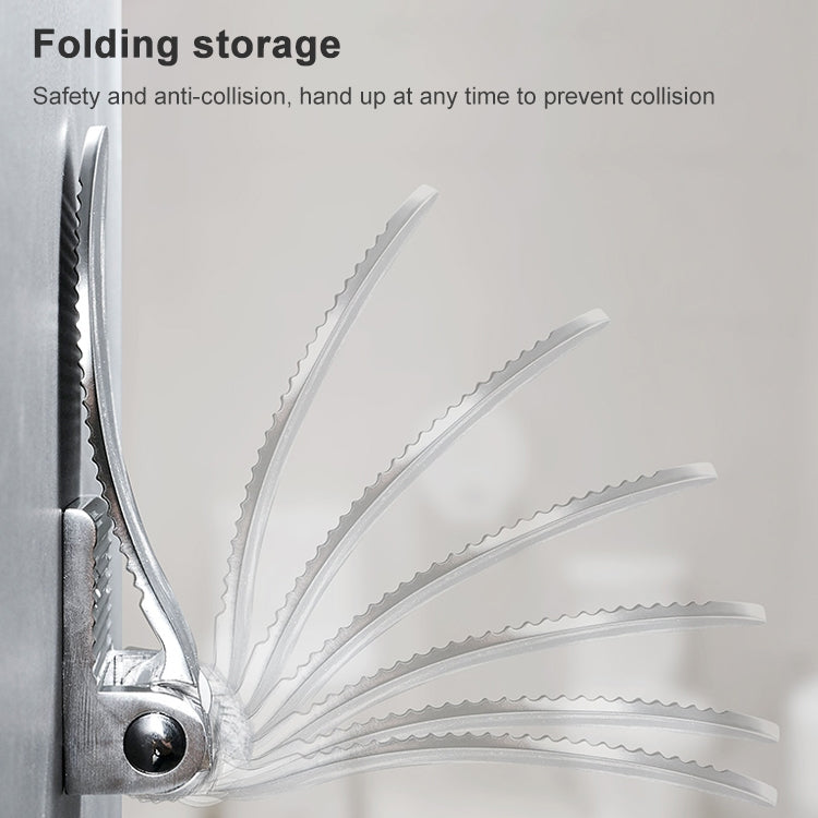 Silver folding shower foot rest folded for storage