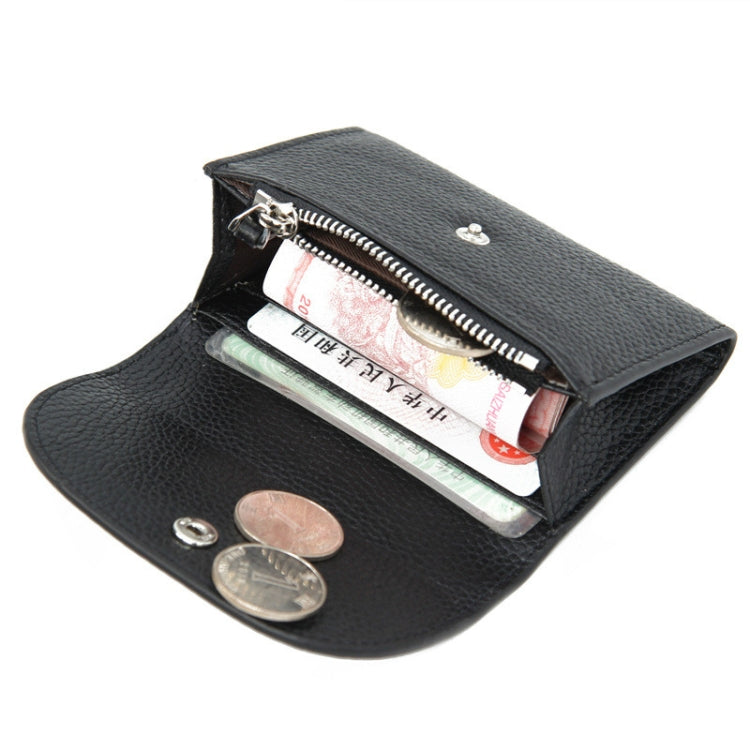 Black leather wallet open to show coin zipper pocket, cards, and metal snap