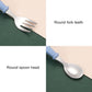 Baby fork and spoon with rounded tines and smooth spoon head