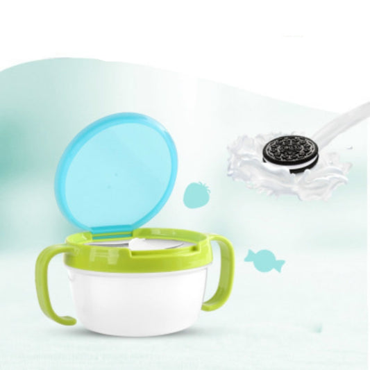 Blue-lidded baby snack cup with green handles and open anti-sprinkle bowl