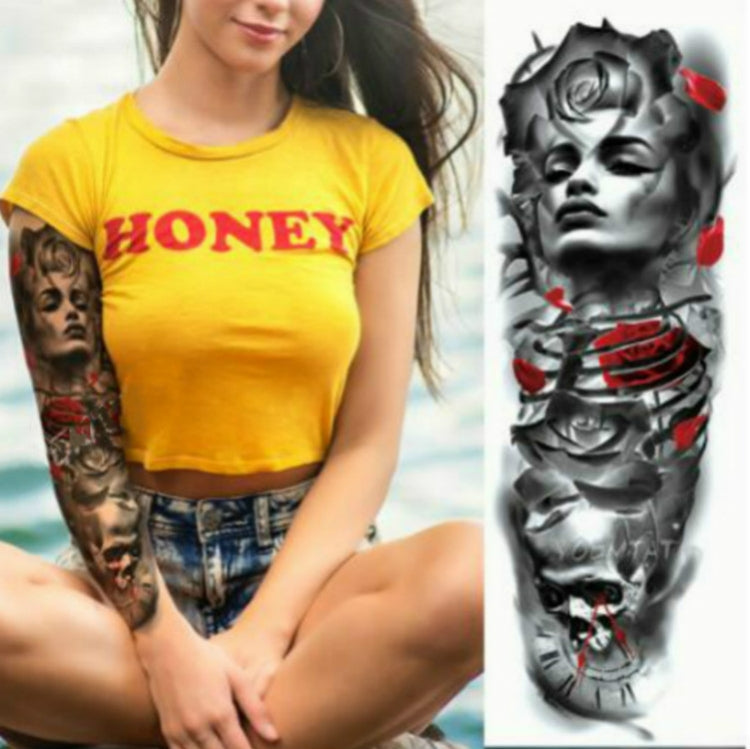 Large arm sleeve temporary tattoo sticker with grayscale surreal face, red rose accents, and flowers.