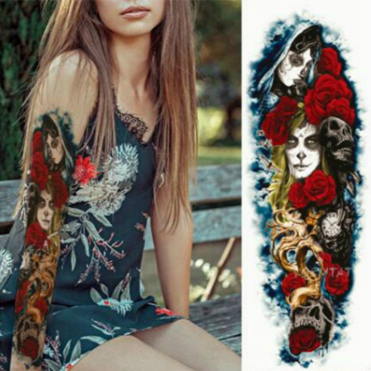 Large arm sleeve temporary tattoo sticker with red roses, skull faces, and dark ornamental vines.