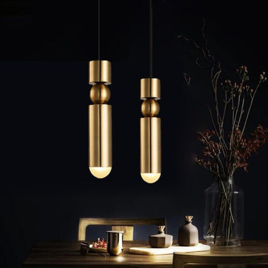 Brass multi-drop pendant chandelier with two vertical tube shades and bulb-like domes