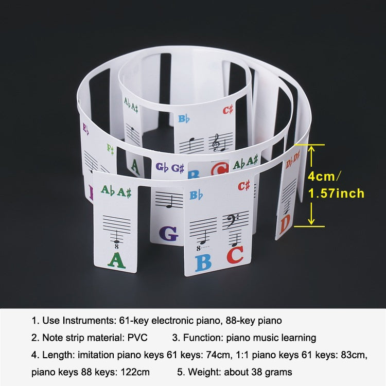 Rolled imitation piano key stickers with colorful A–G notes on a wristband-style strip.