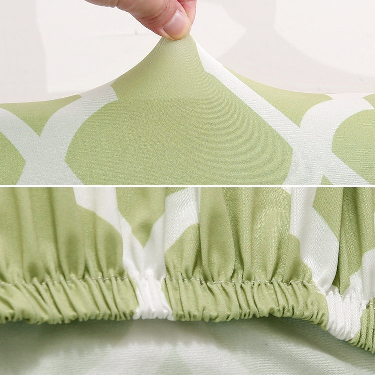 Stretch chair cover fabric close-up in light green trellis pattern with elastic hem