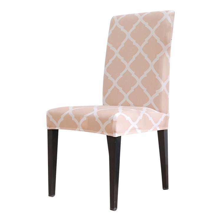 Blush pink stretch chair cover with white geometric lattice pattern on seat and back
