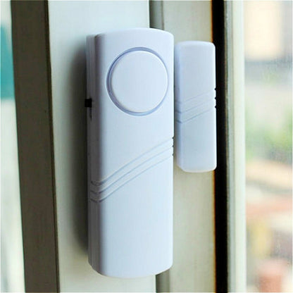Wireless door/window magnetic alarm sensor with circular button, white housing