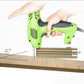 Green electric nail gun in use on a wood board, black grip and metal nose