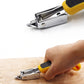 Nail remover tool with yellow handle clamped onto a wooden board