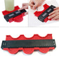 Red irregular contour gauge tool with black measuring ruler and wavy edge