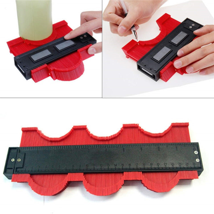 Red irregular contour gauge tool with black measuring ruler and wavy edge